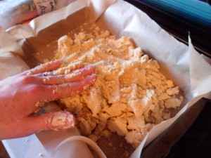 Push in to the tin with your hands