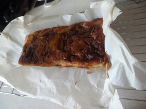 Then transfer to a wire rack still in the greaseproof paper to cool a bit more.