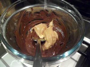 When the chocolate is melted add your 1 and 1/2tbsp of smooth peanut butter and stir.